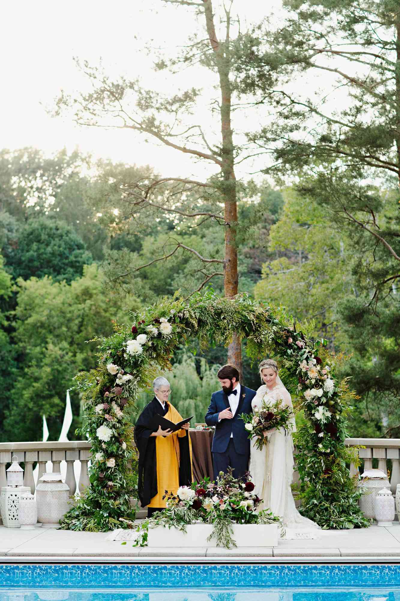 Unkempt Willow Branch Wedding Arch with Pink and Orange Flowers