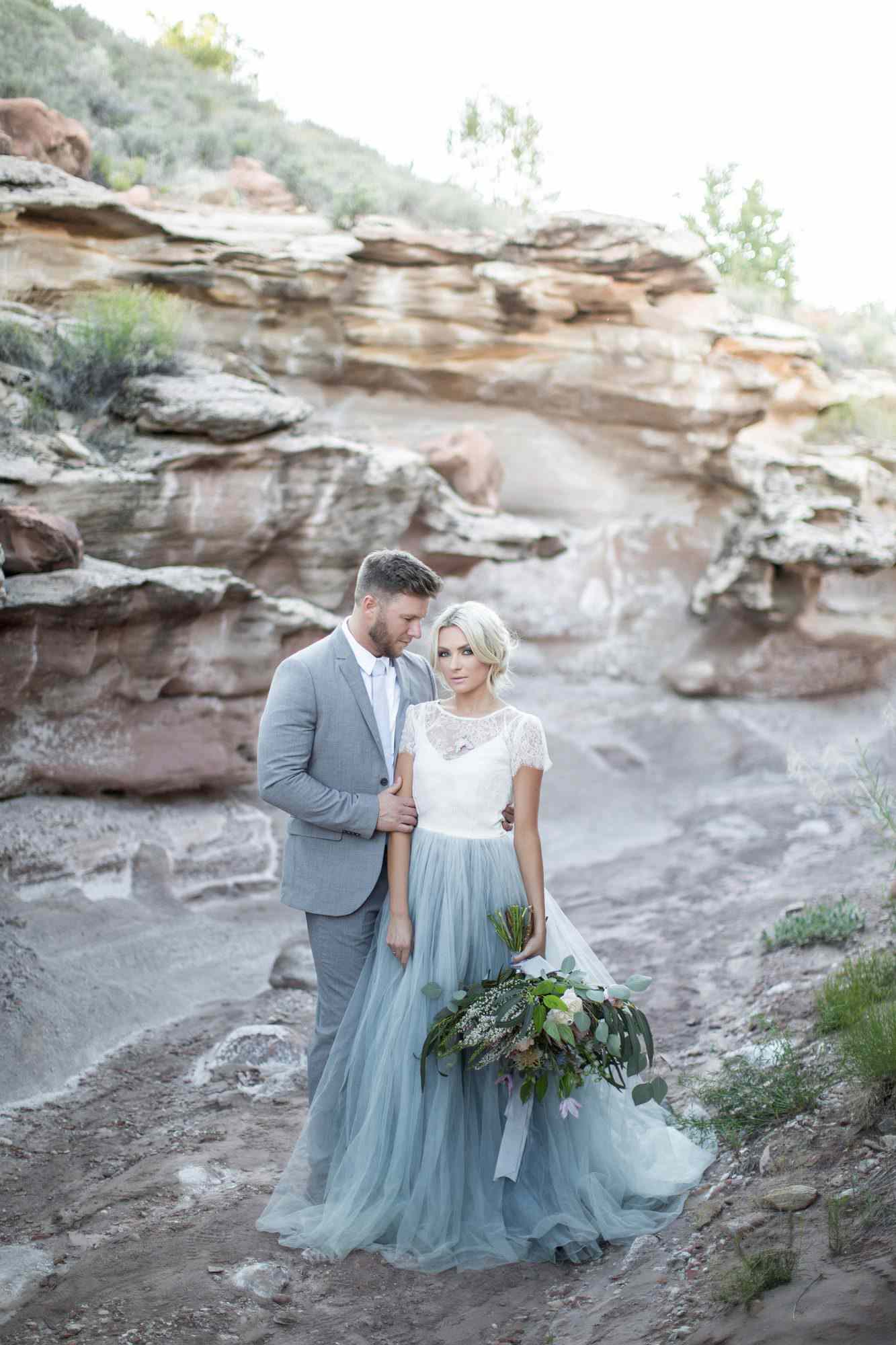 two-toned wedding dress with white top and blue tulle bottom