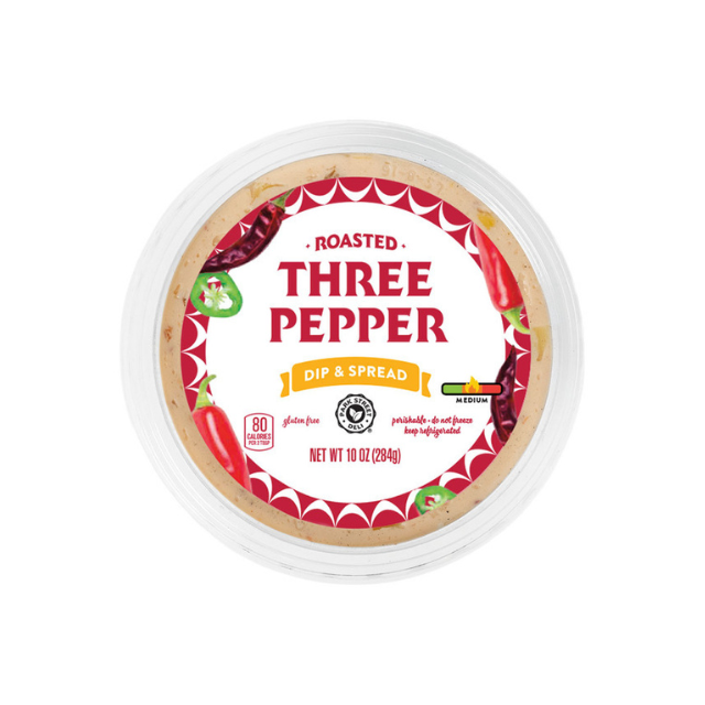 Container of roasted three pepper dip and spread brand label visible