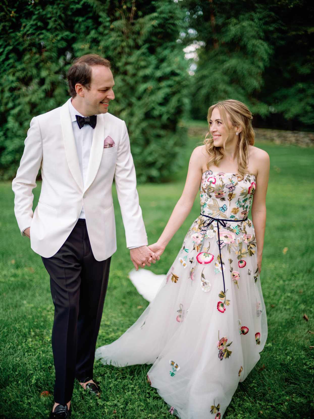 wedding couple portrait walking in garden