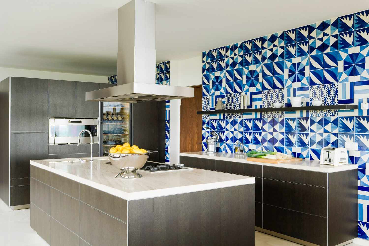 Kitchen with blue tile wallpaper