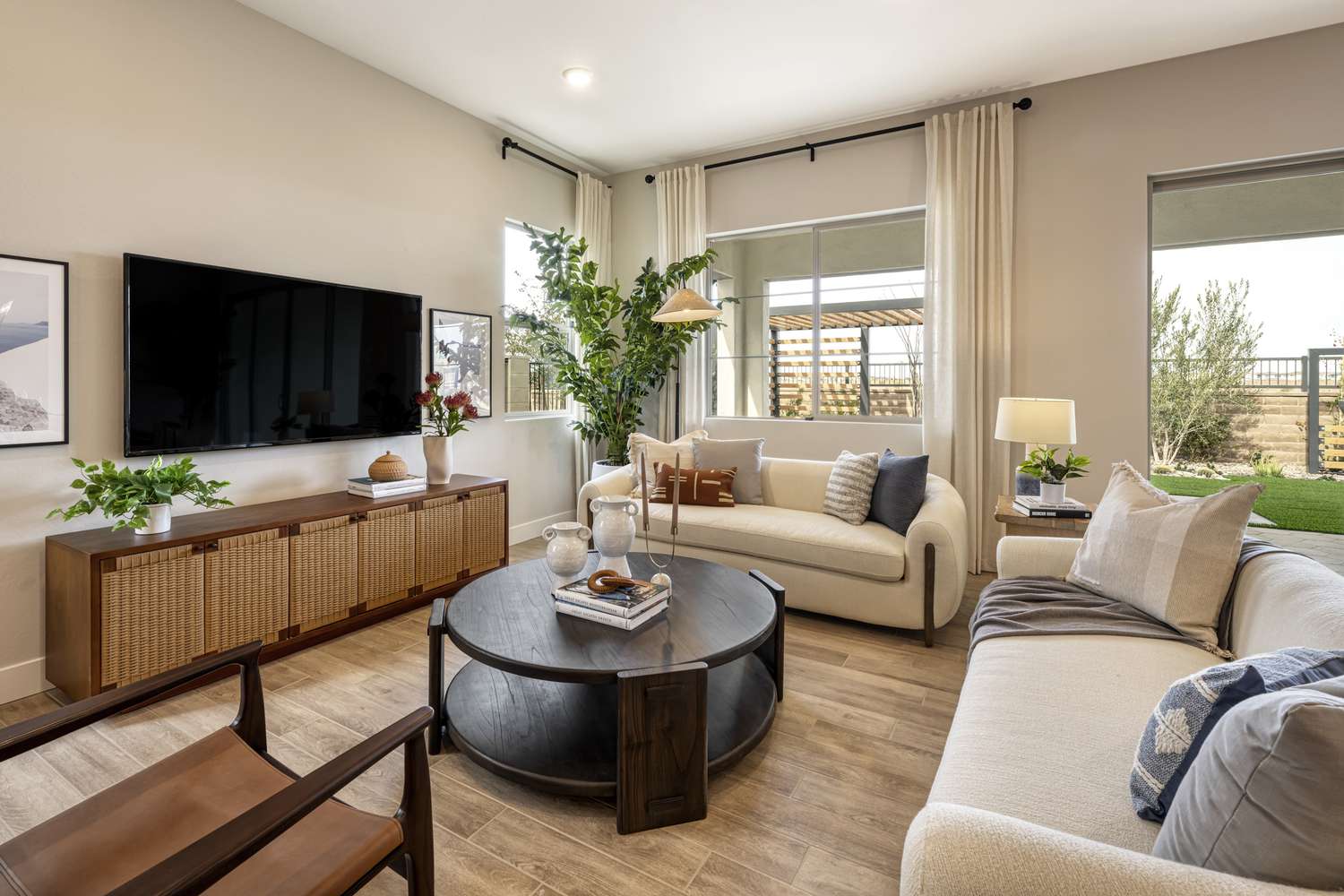 Mounted TV Above Long Credenze