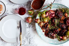 miso-tomato braised short ribs plated with pomegranate