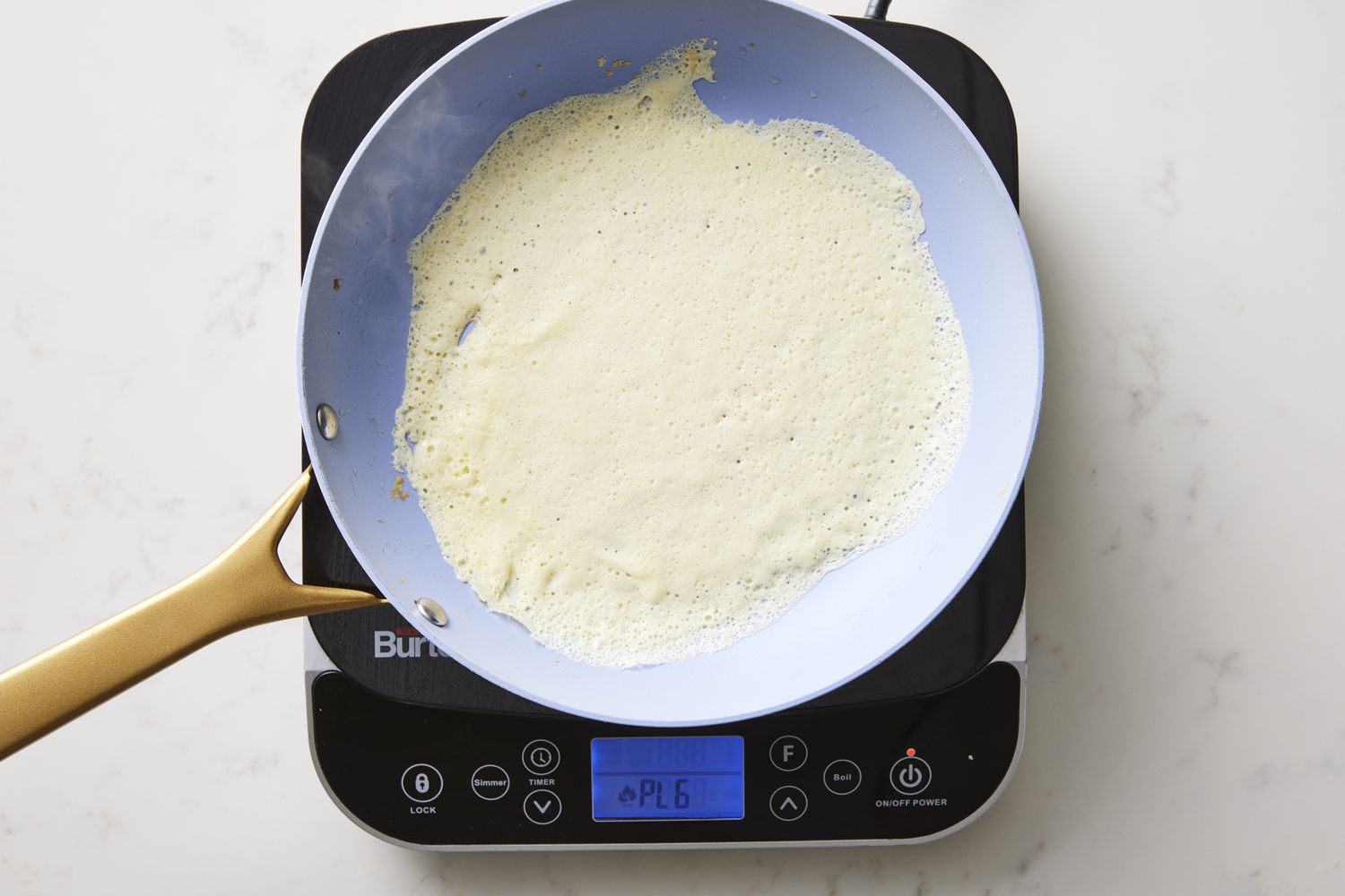 Crepe cooking in skillet