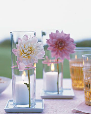 flowers in vases on table outdoors