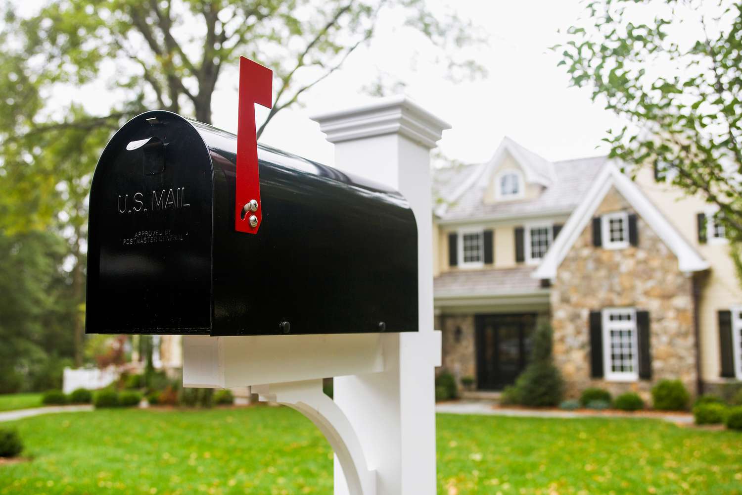 Black mailbox in front of home