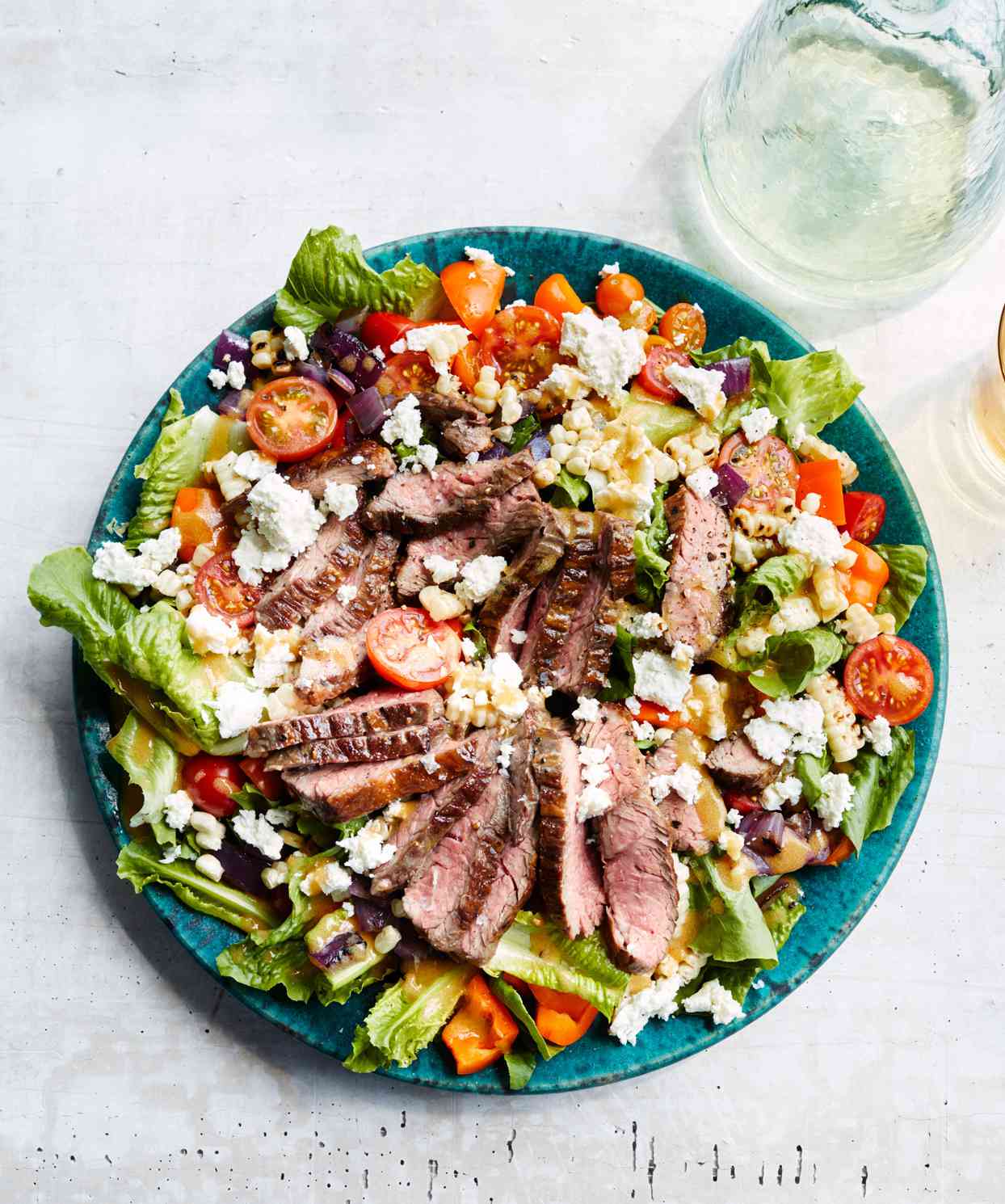 grilled skirt-steak salad topped with feta