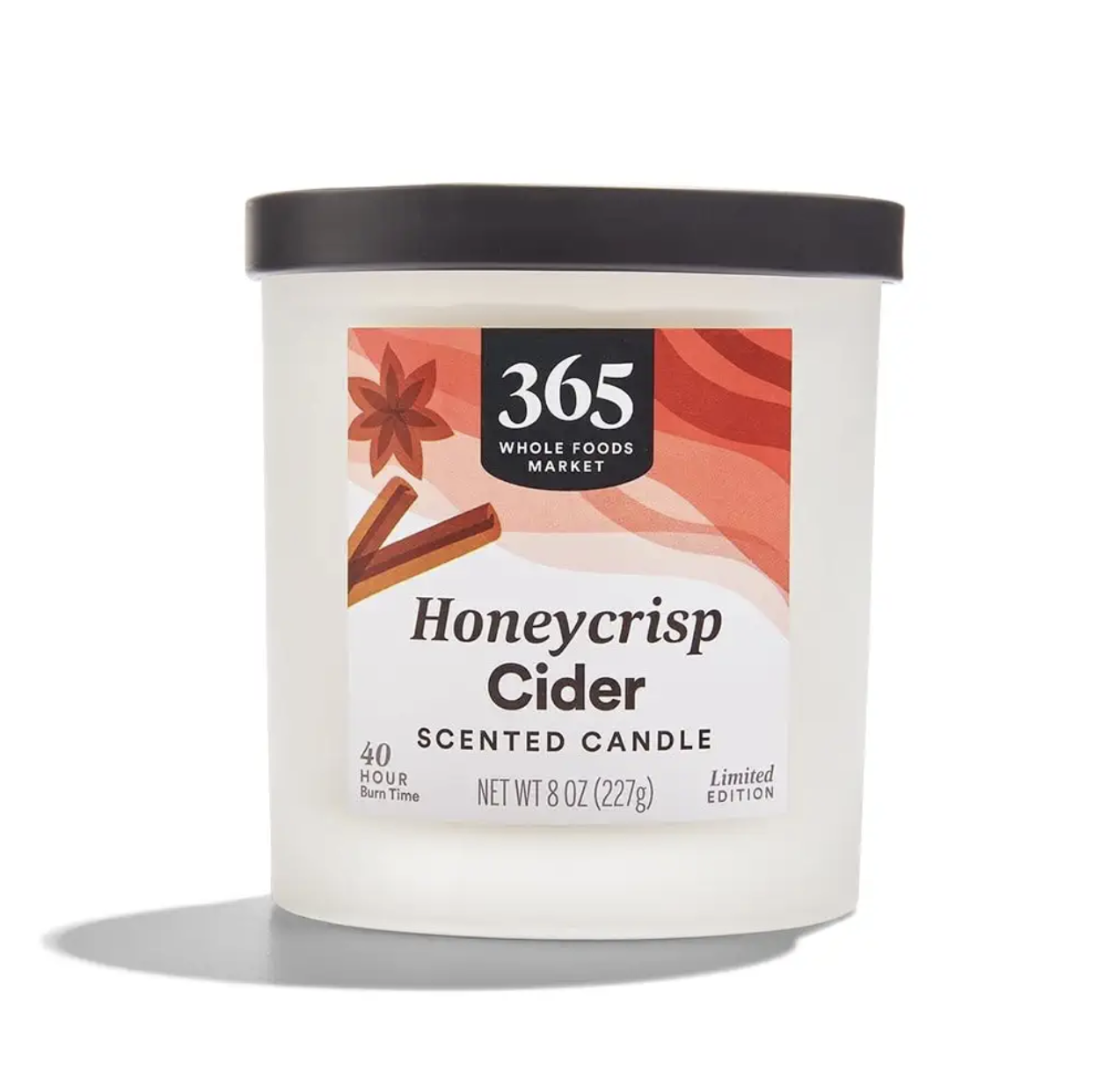 A 365 Honeycrisp Cider scented candle with a black lid 40hour burn time 8 oz limited edition displayed on a white background