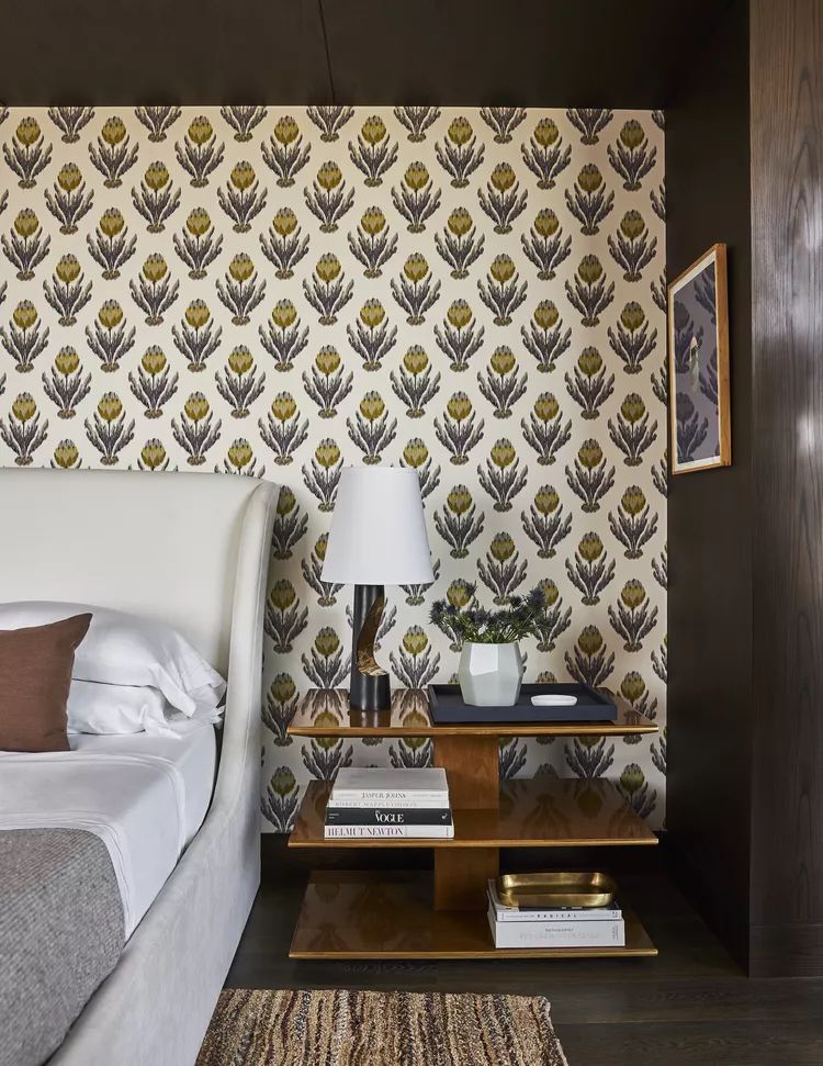 black bedroom with fun wallpaper