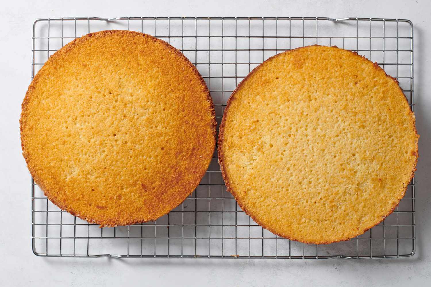 baked cakes cooling on rack