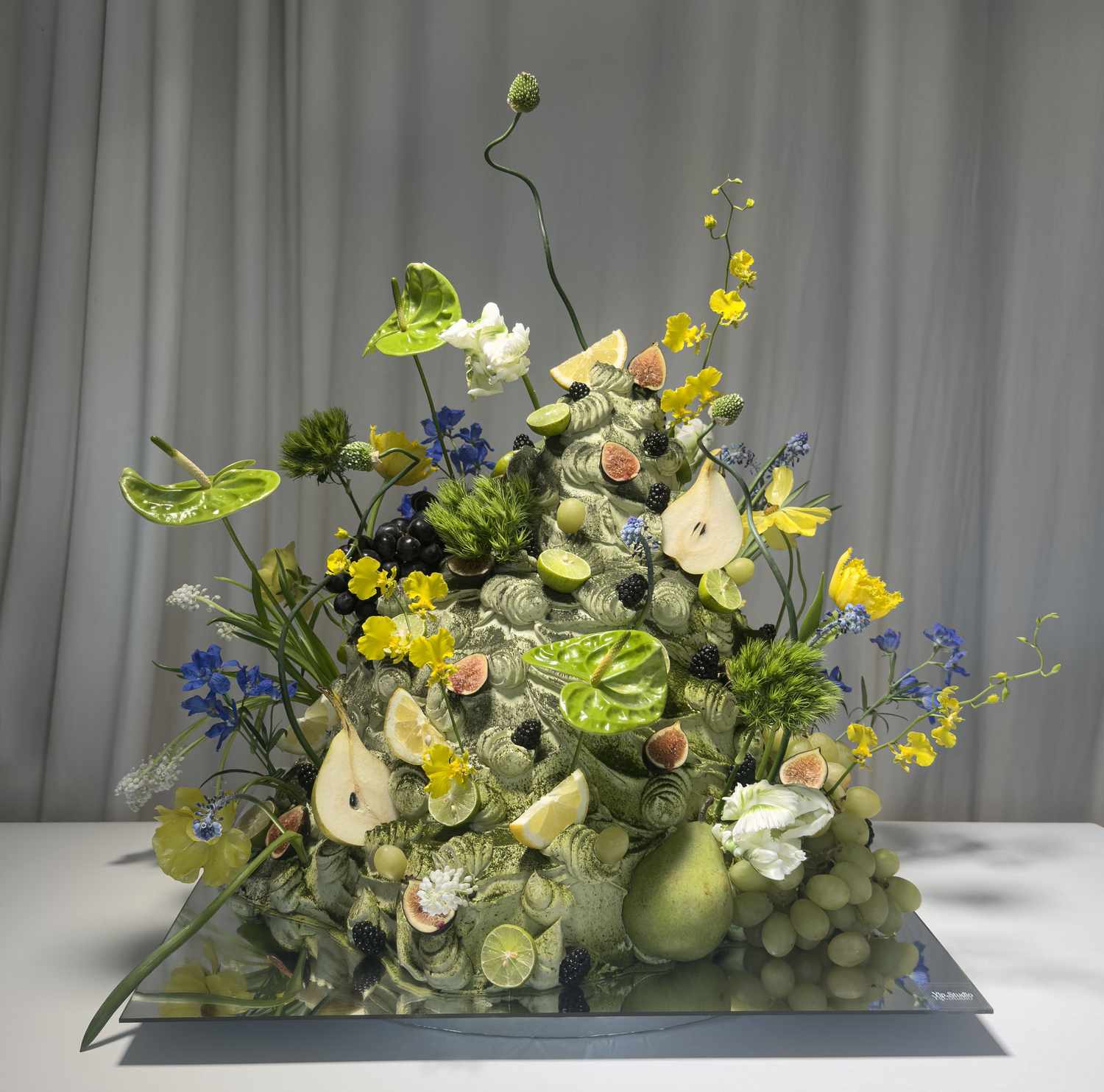 green and floral maximalist cake