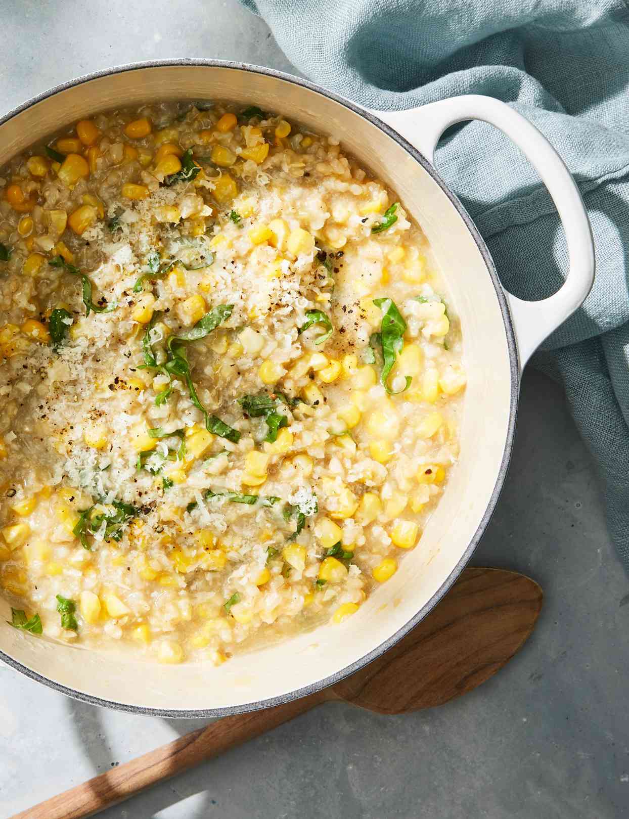 sweet corn-brown rice risotto garnished with basil