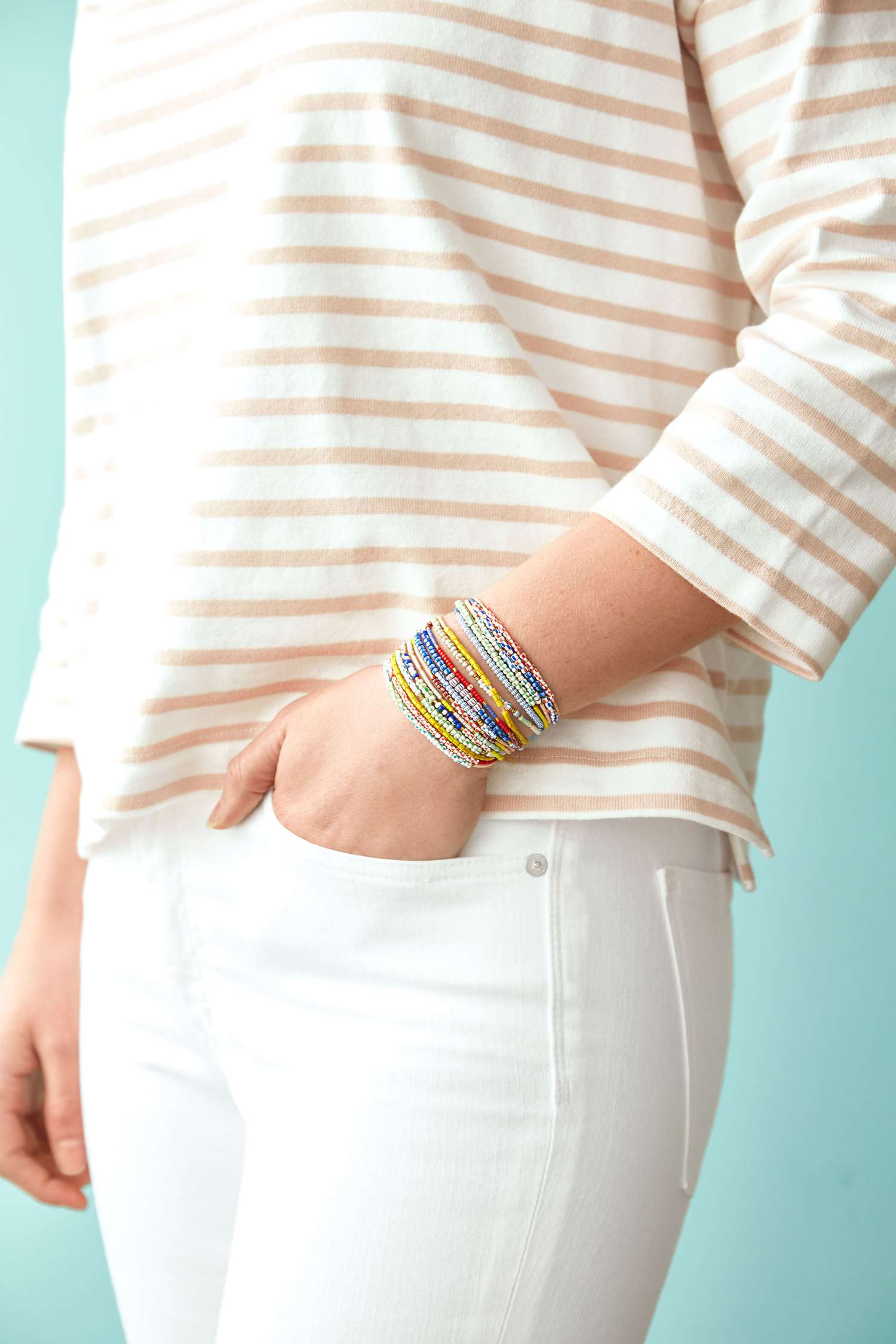 seed bead bracelets on figure