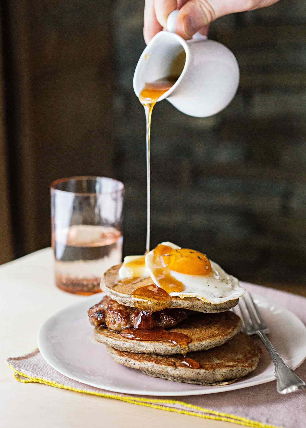 Buckwheat Pancakes with Maple Syrup and Fried Egg