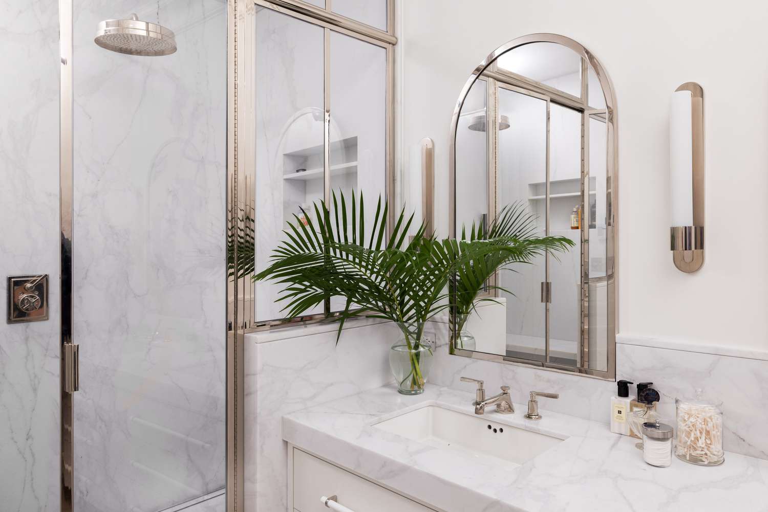 white bathroom with white metal accents