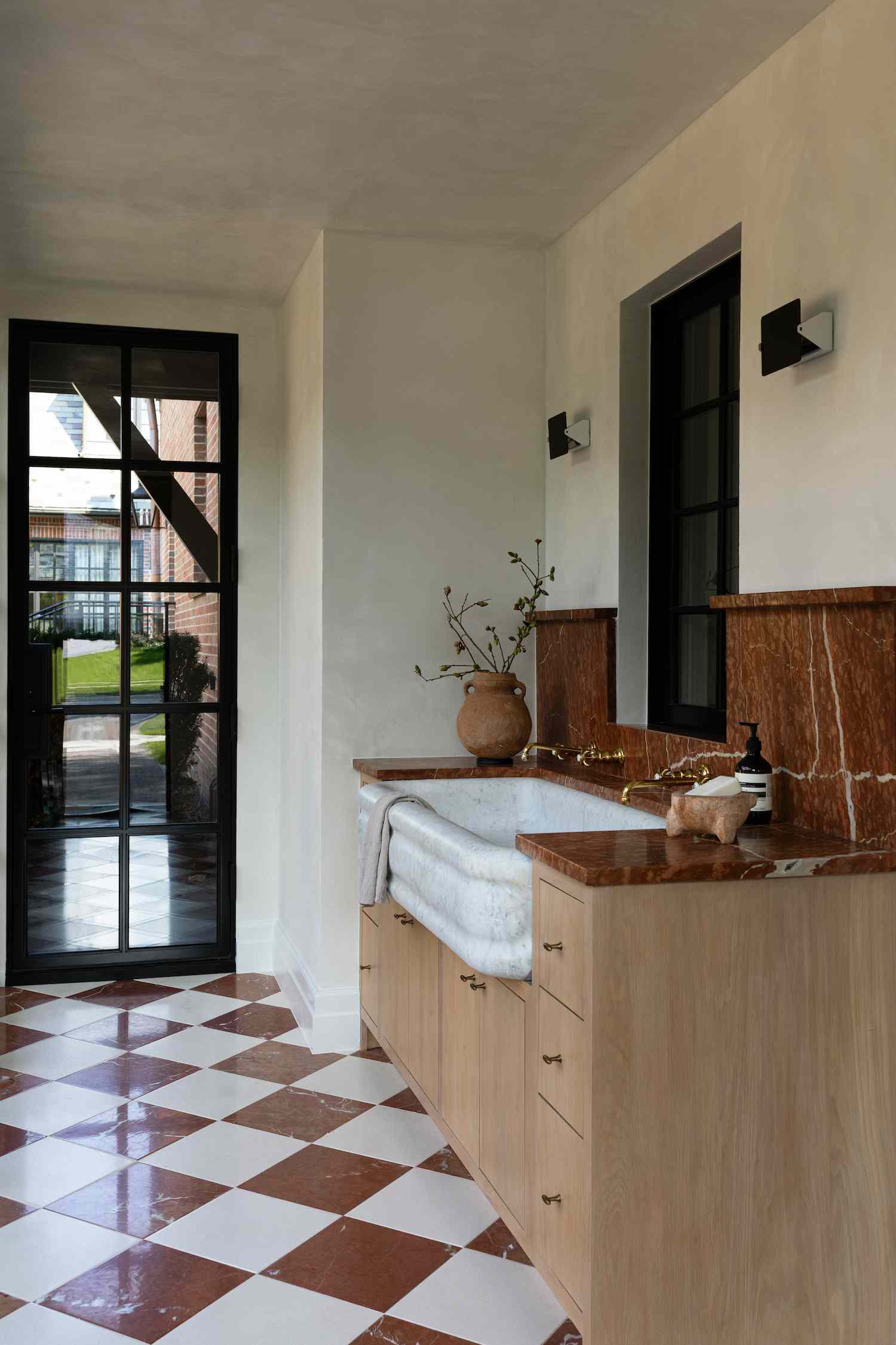 mudroom hallway with marble sink