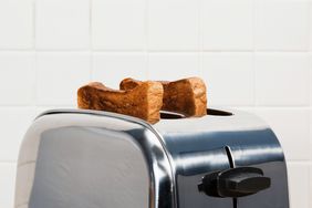 Toast in toaster on kitchen countertop