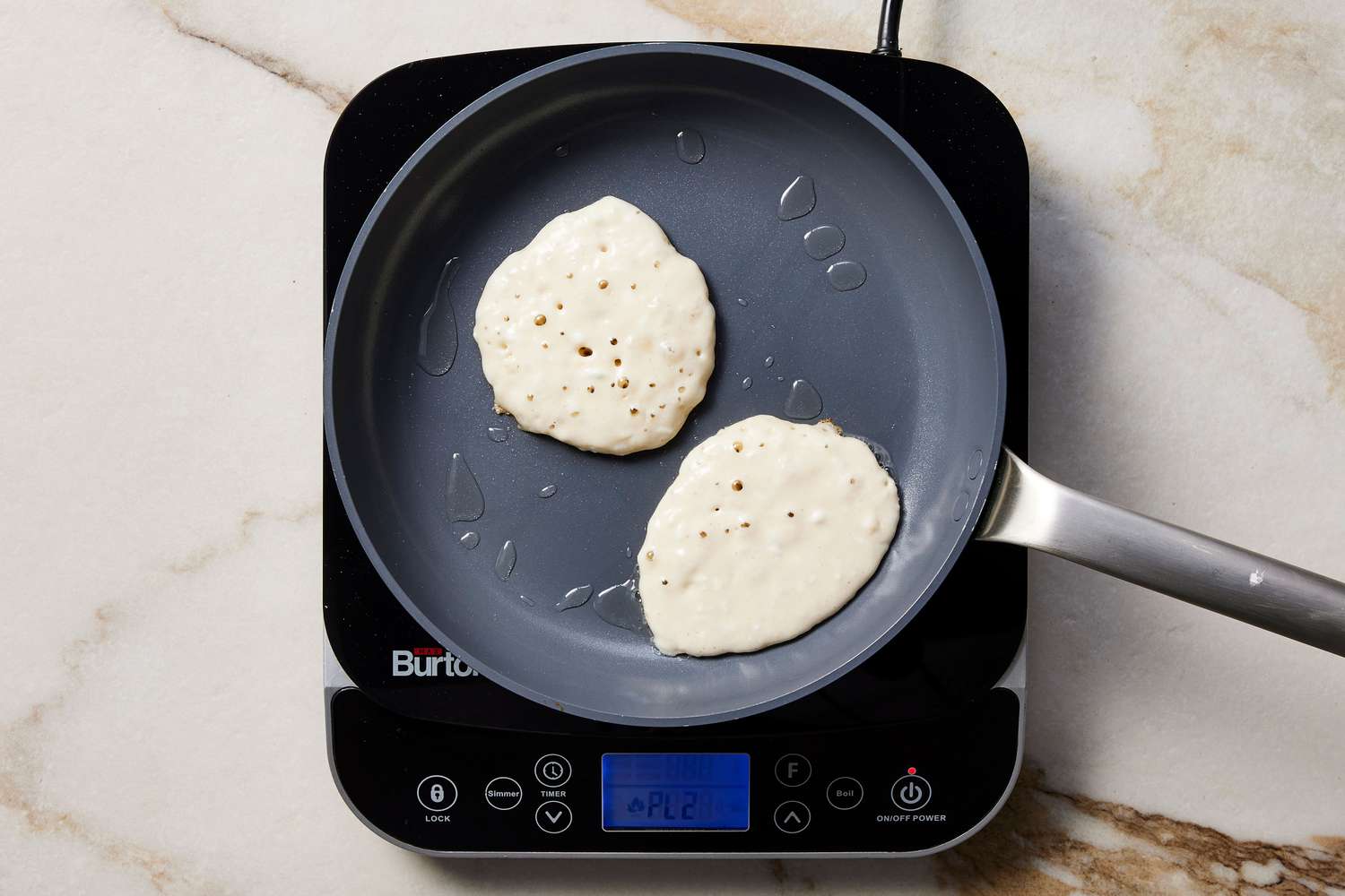 Pancakes cooking in skillet