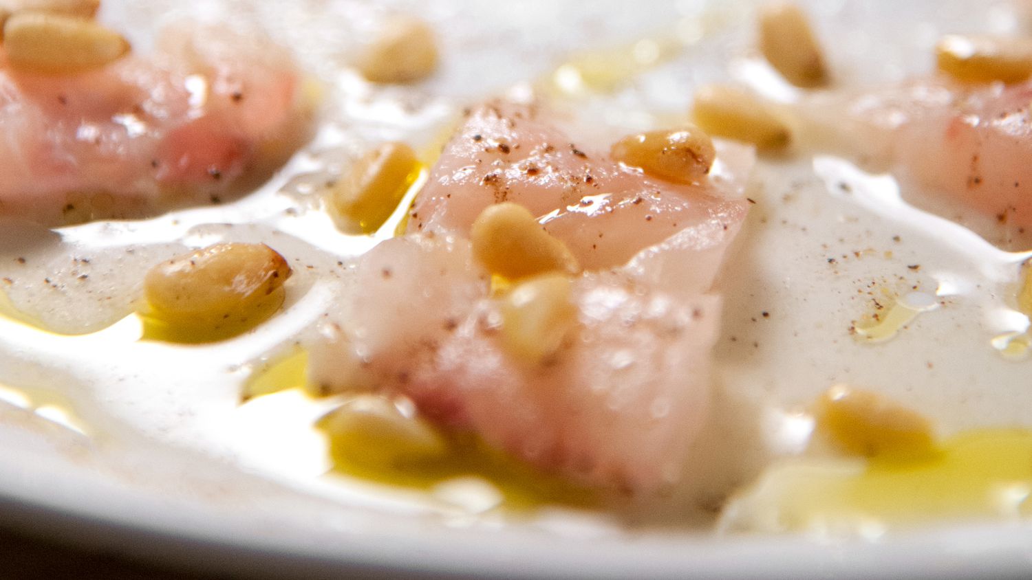 porgy crudo with pine nuts