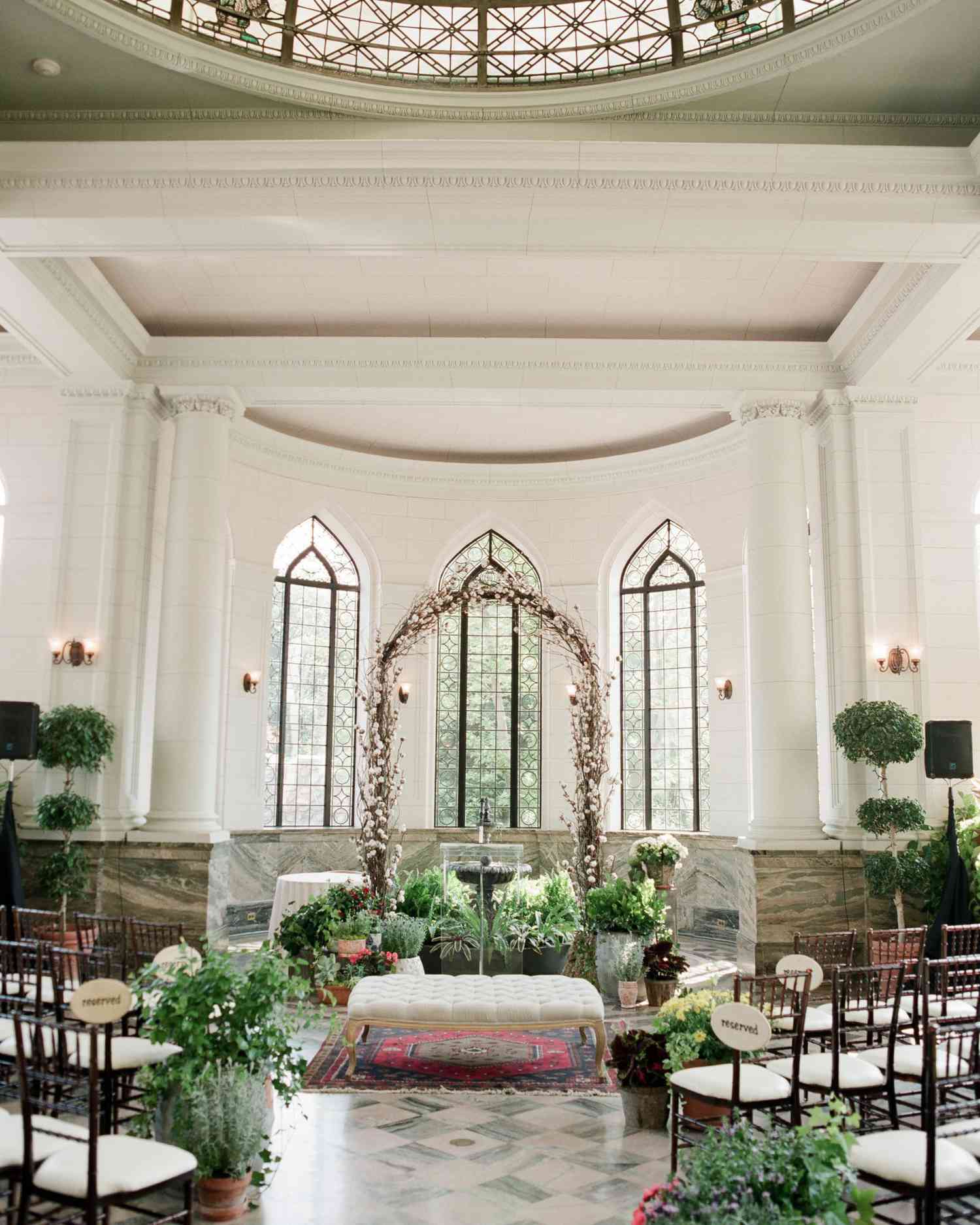 Unkempt Willow Branch Wedding Arch with Pink and Orange Flowers