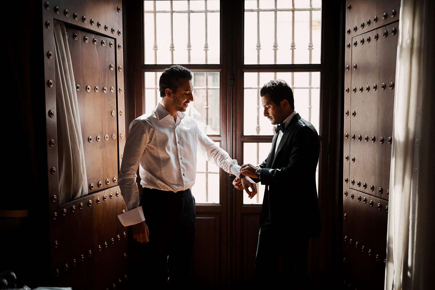 karolina sorab wedding groom help with cuff links