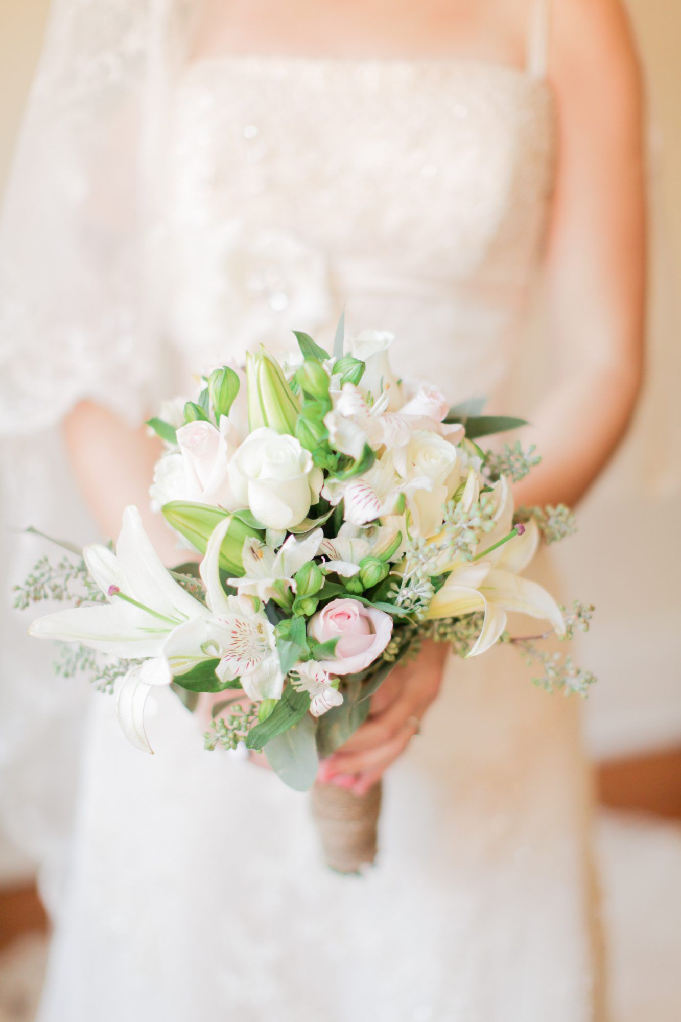 bouquet with lilies seeded eucalyptus and garden roses