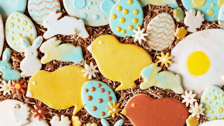 colorful frosted spring themed and easter egg sugar cookies