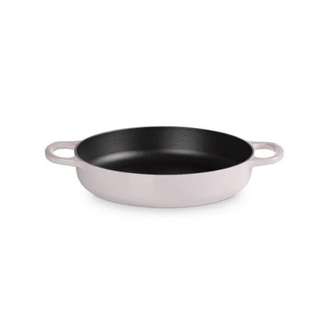 A cast iron skillet with dual handles