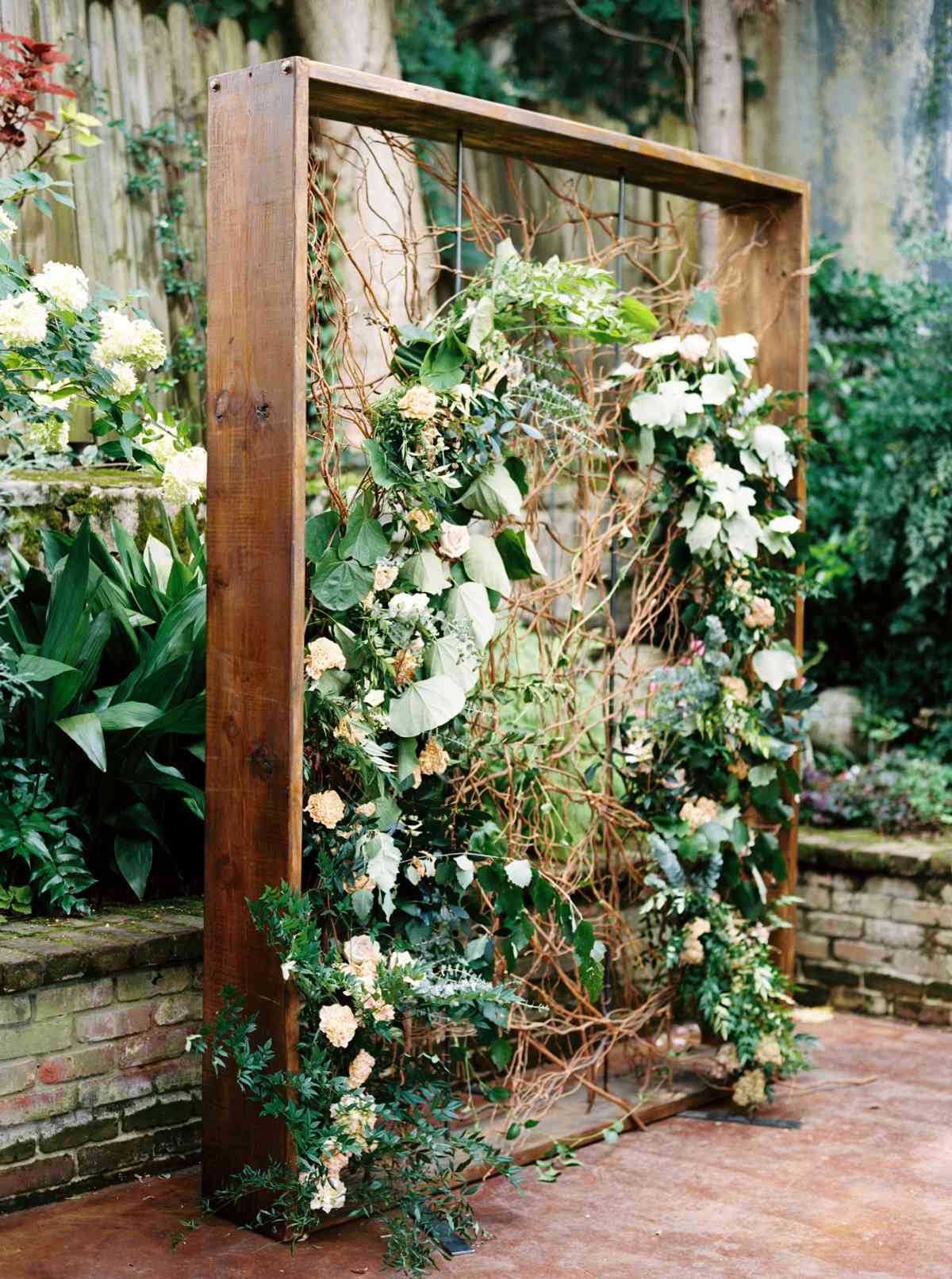 wedding plant wall floral arch attached to wood frame