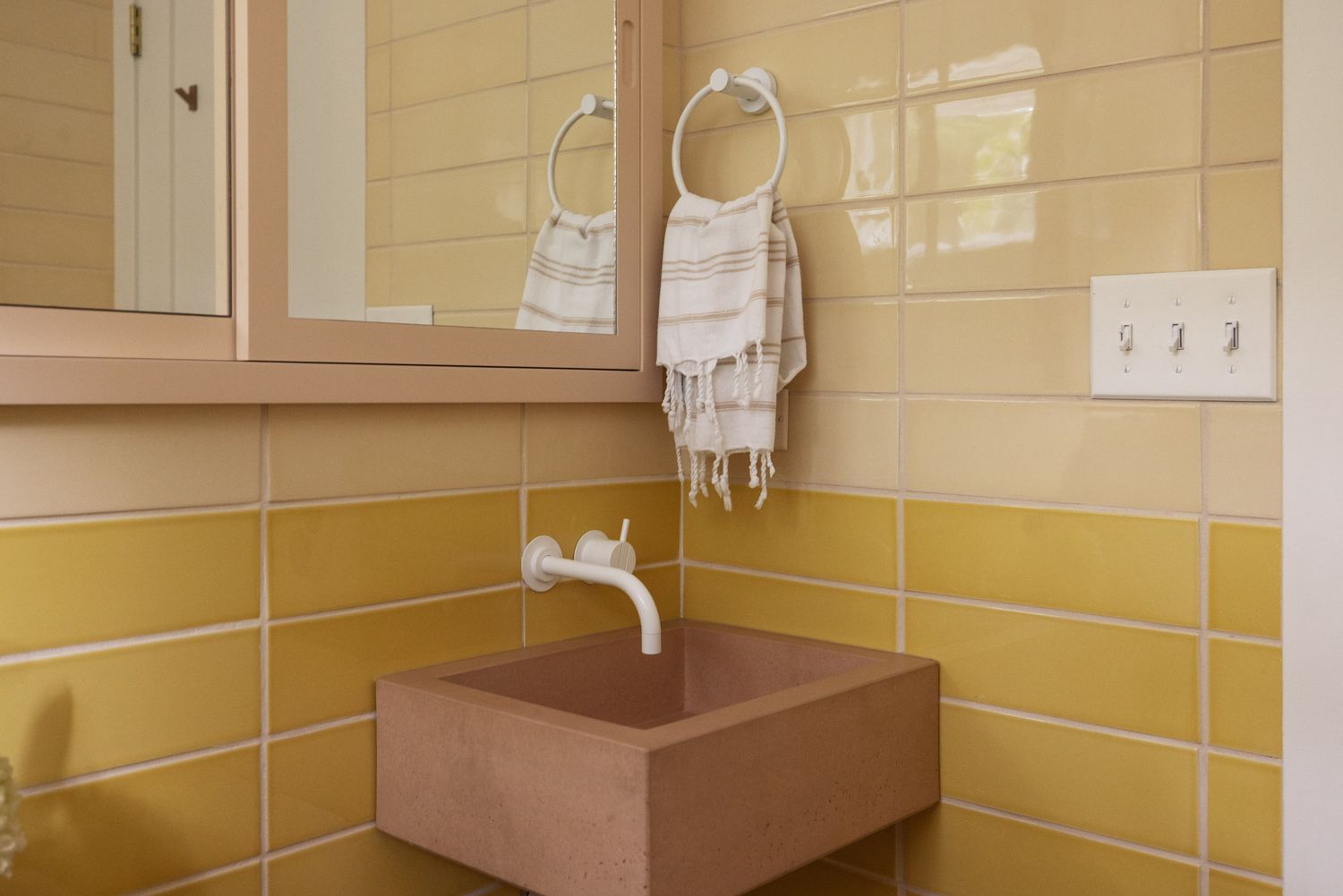 A yellow tile bathroom 
