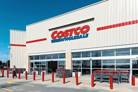 Facade of a Costco Wholesale store with shopping carts in foreground