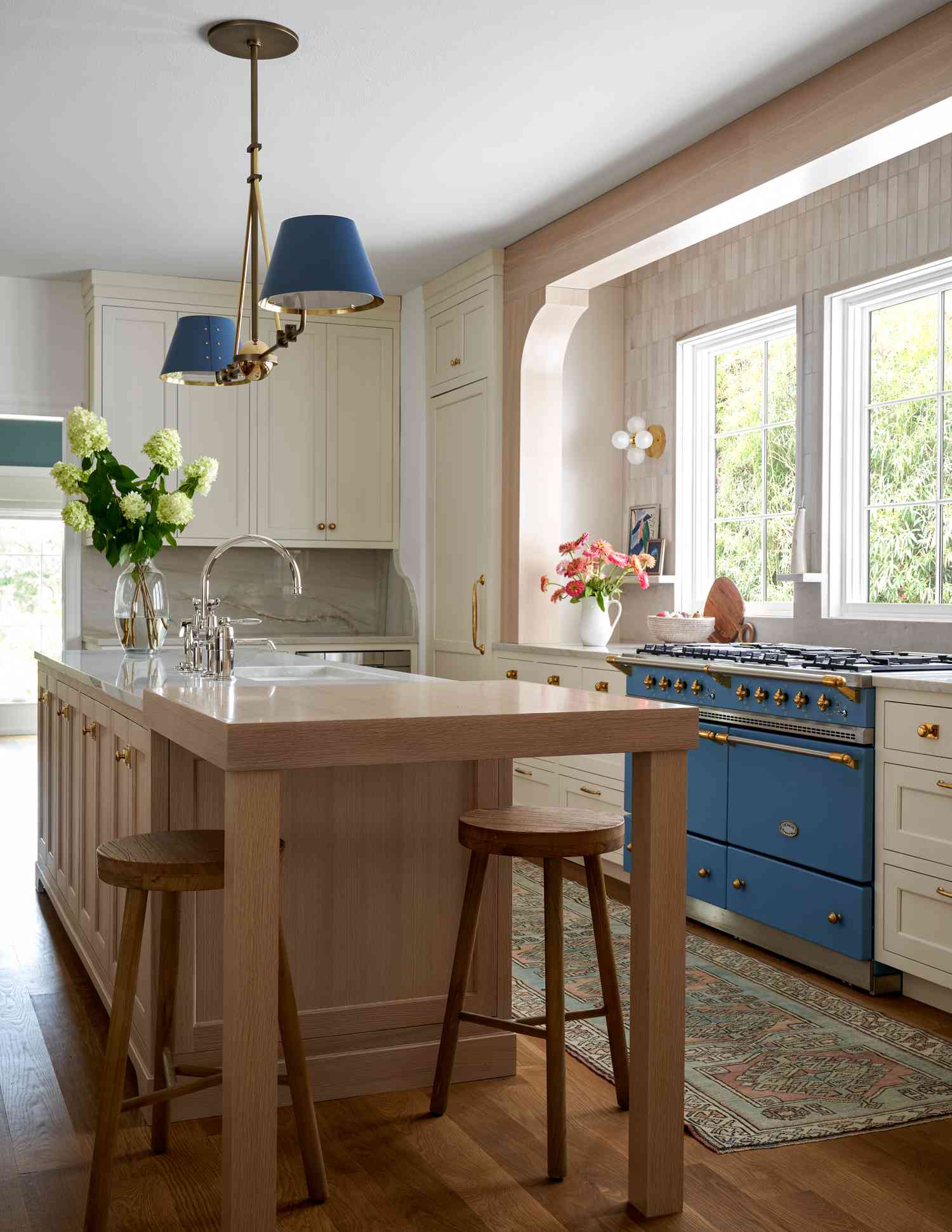 neutral kitchen with brass hardware