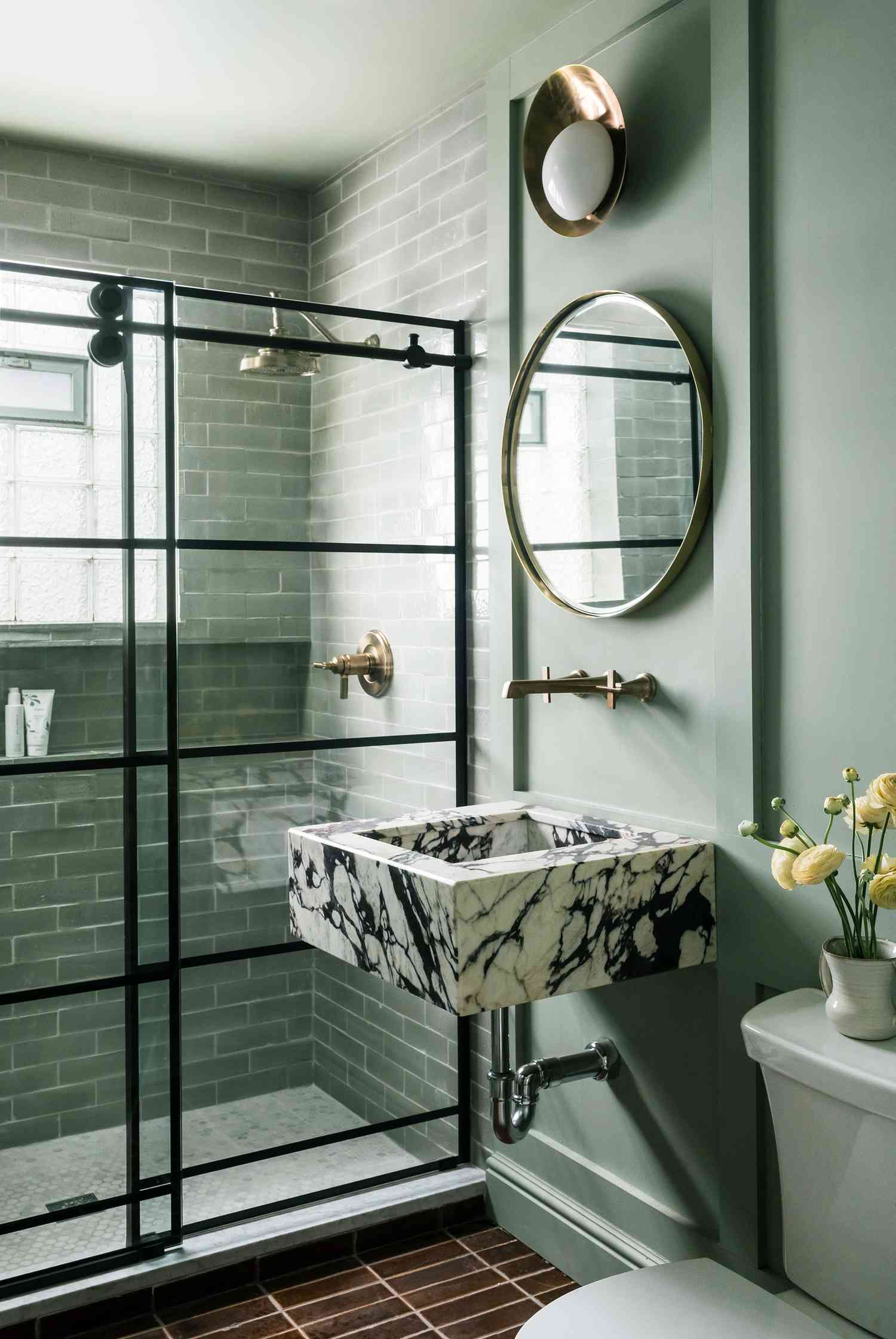 green bathroom with industrial design