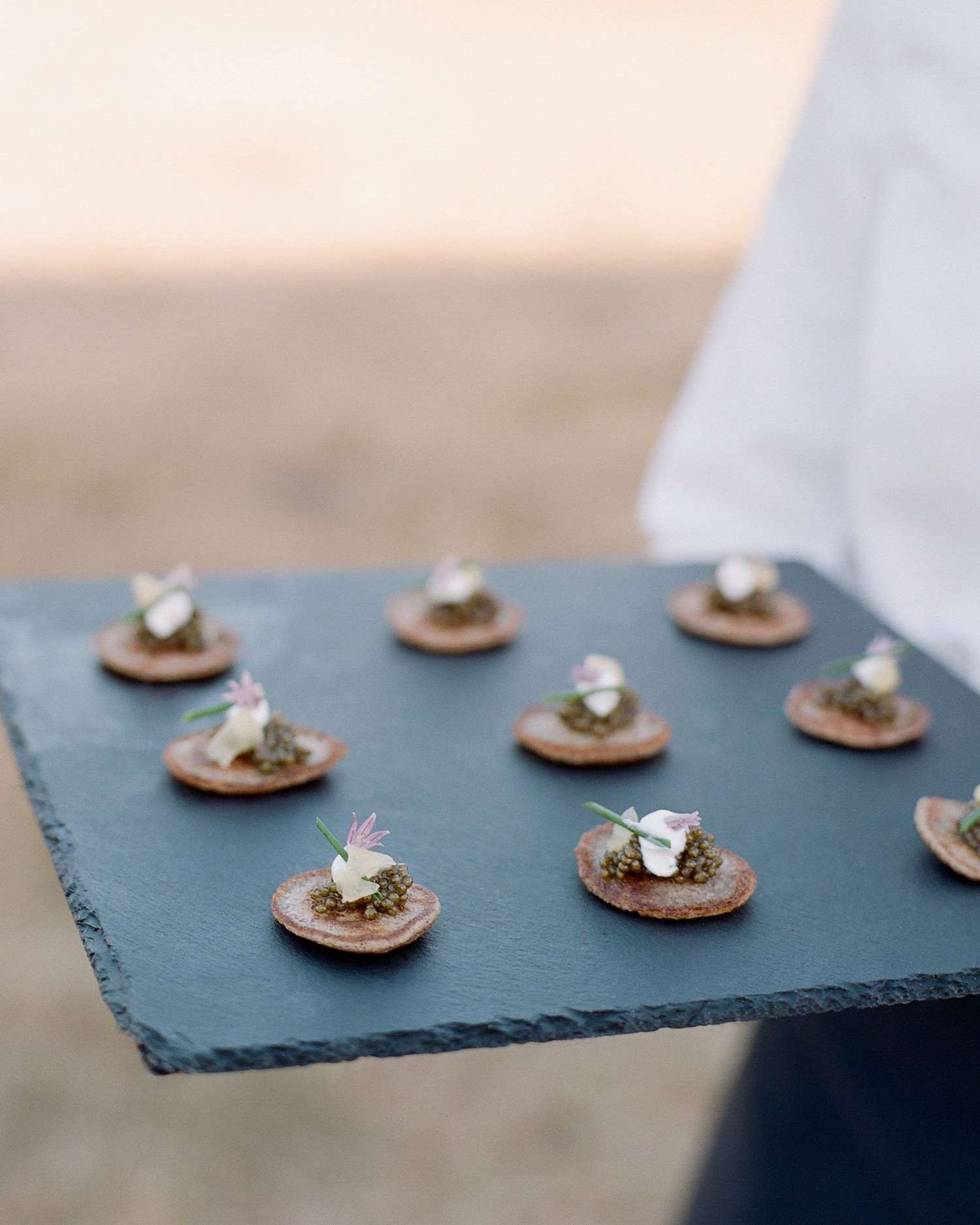 whitney zach wedding appetizer blini with caviar