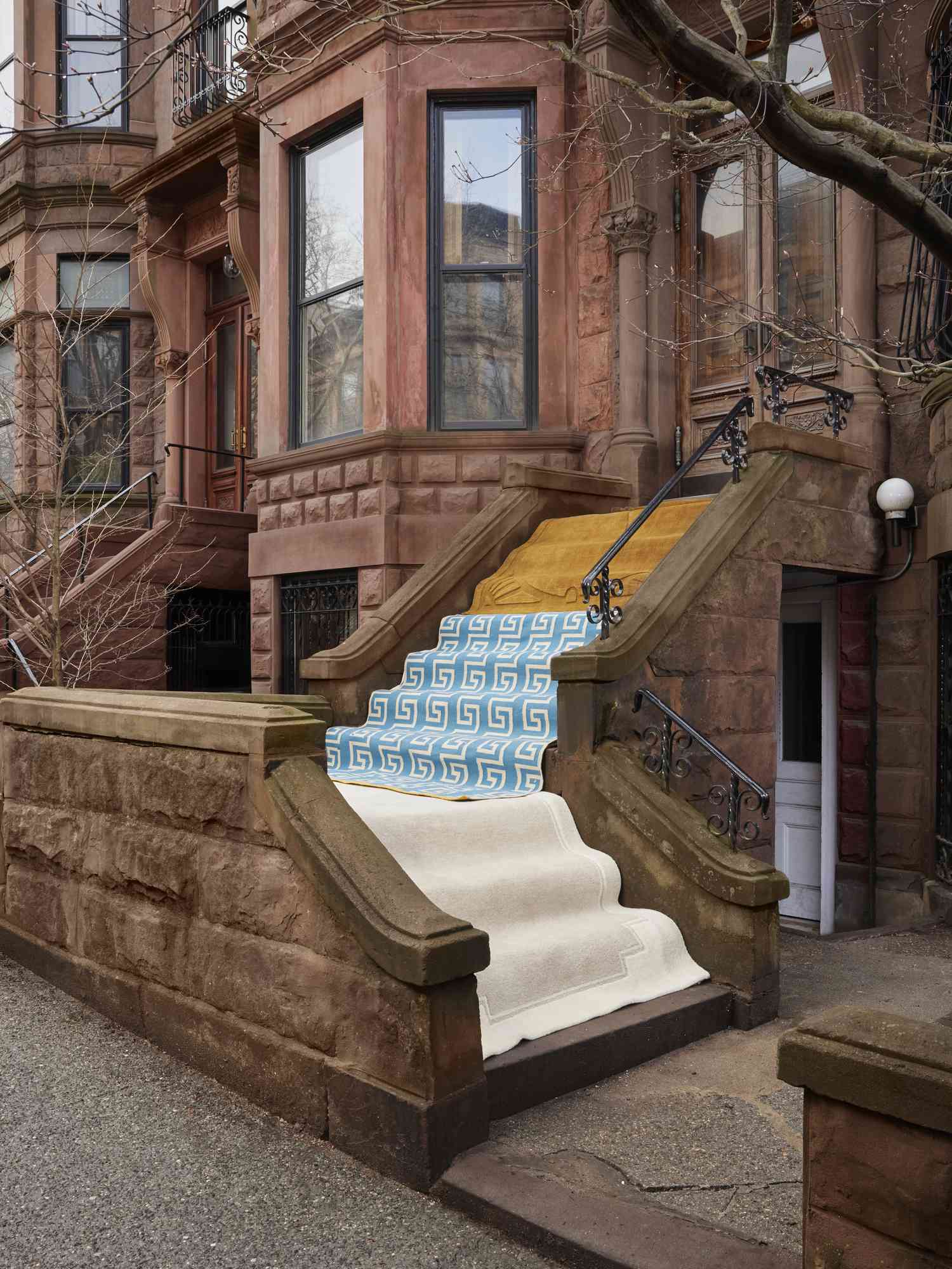 rugs in front of building