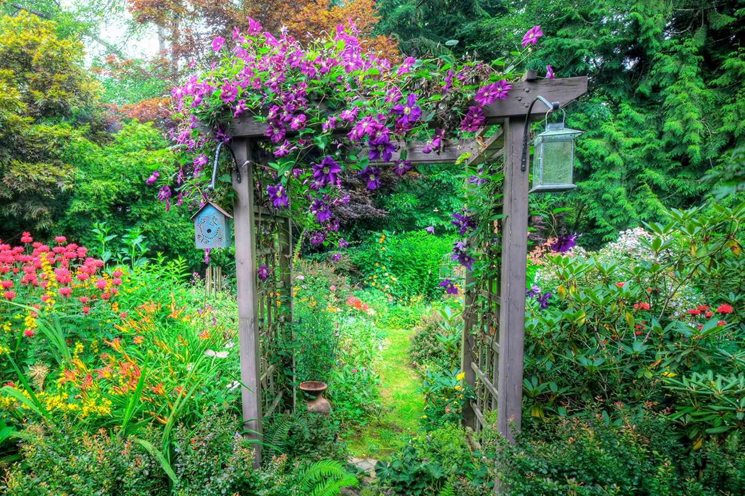 pergola with flowers growing up 