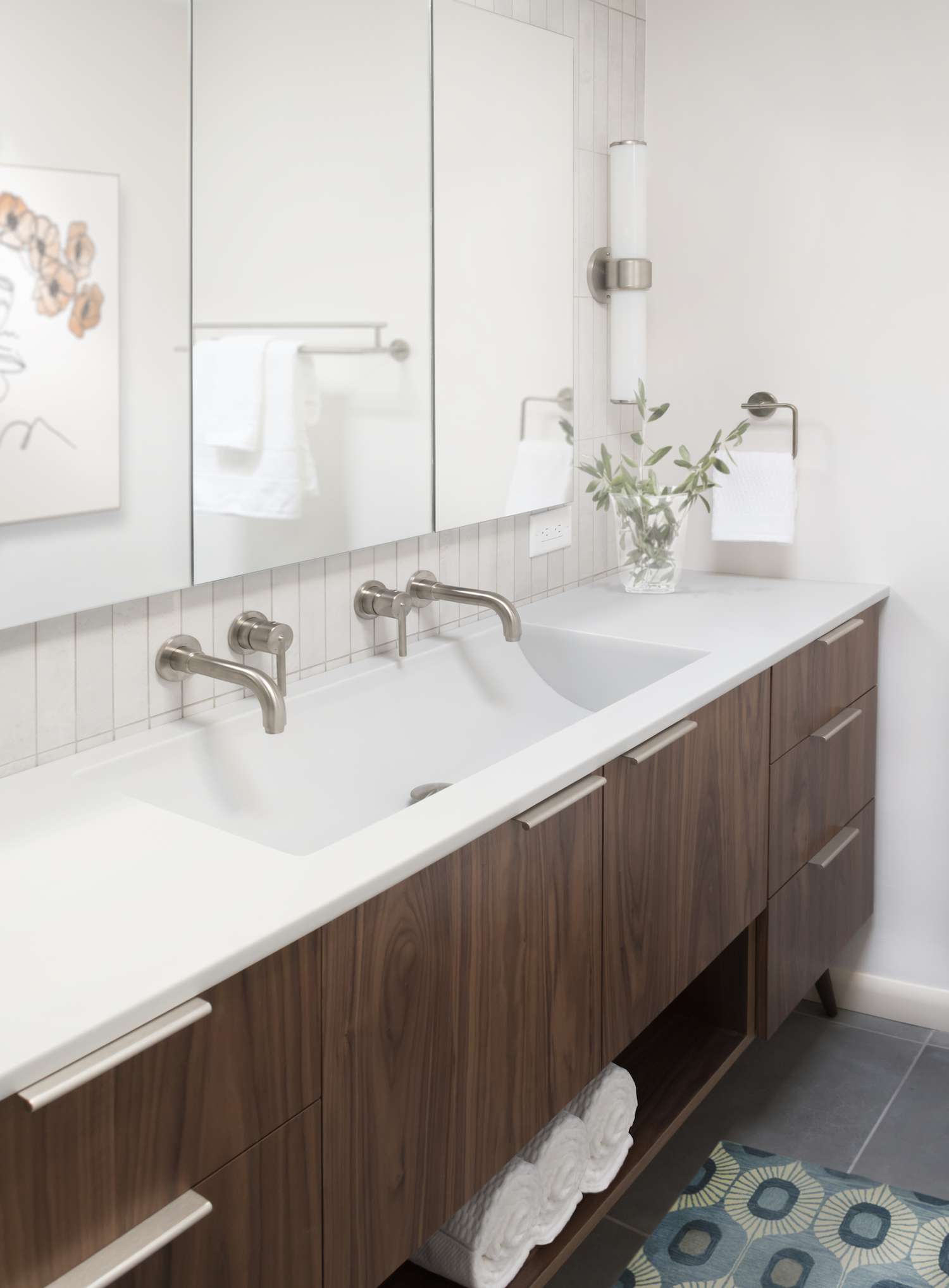 single sink with long countertop in small bathroom