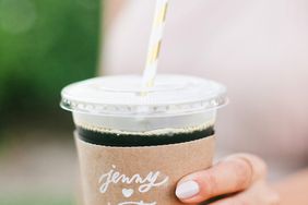 coffee wedding ideas woman holding iced beverage with couple names sleeve