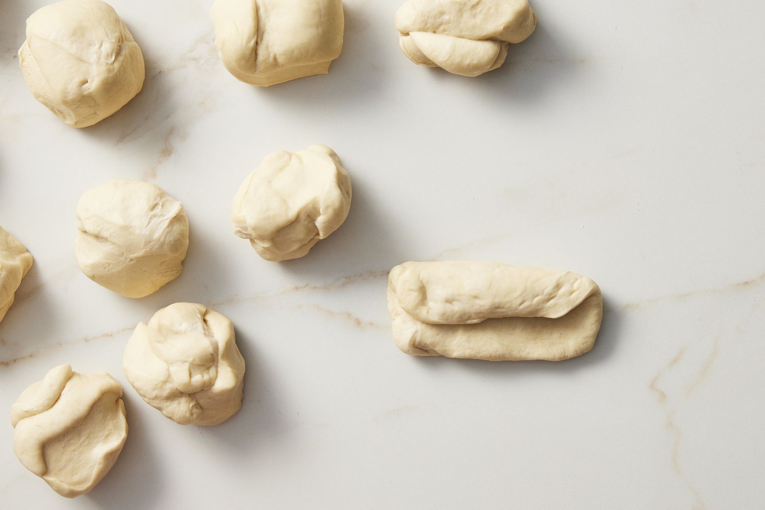 Rolled dough for kaiser rolls