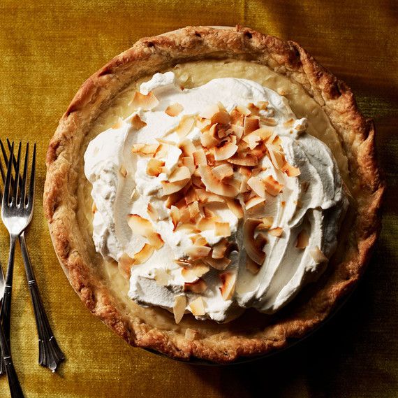 double-coconut cream pie on gold table cloth