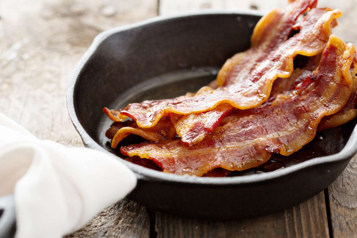 cooked bacon in cast iron skillet