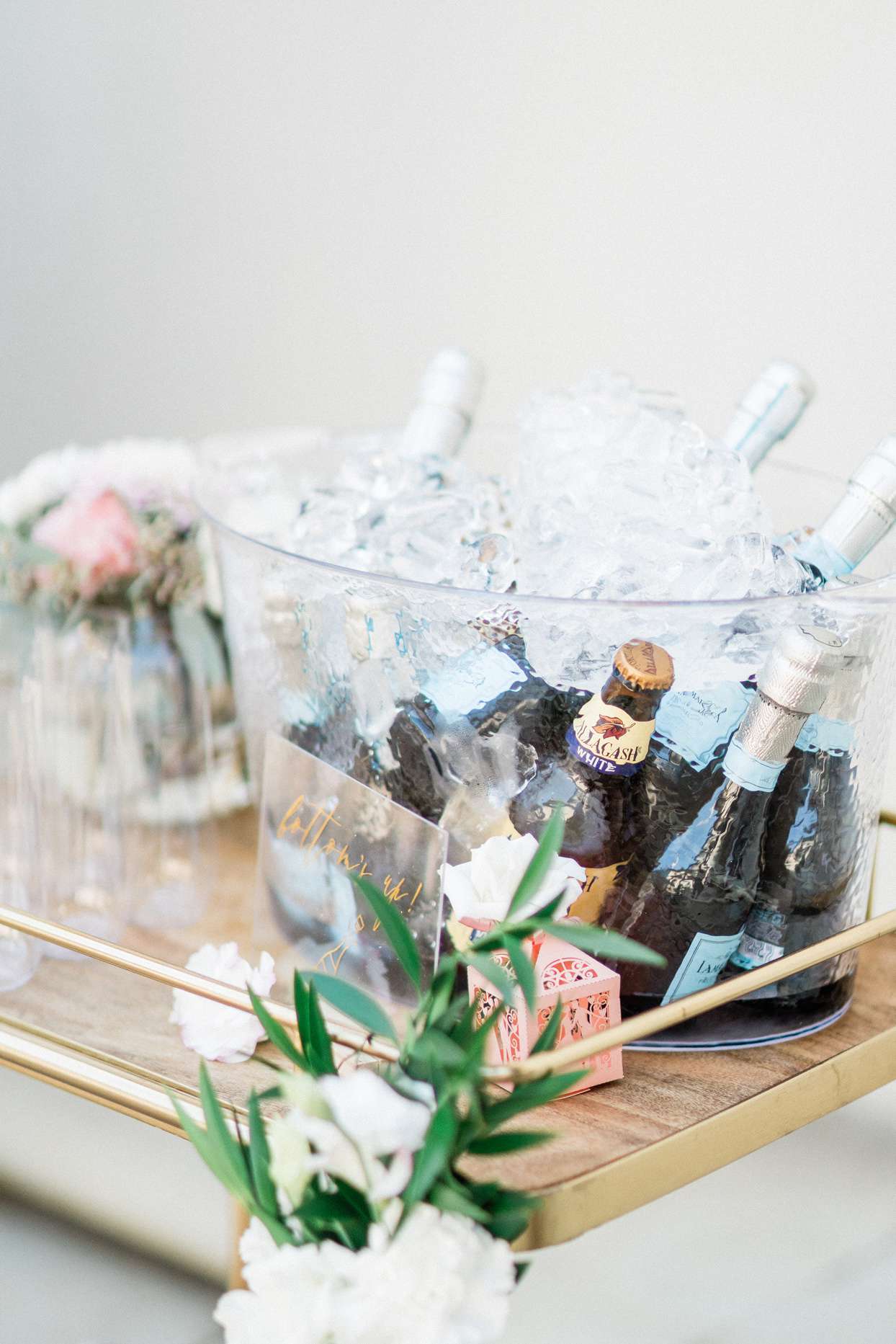 Bucket of ice with champagne bottles