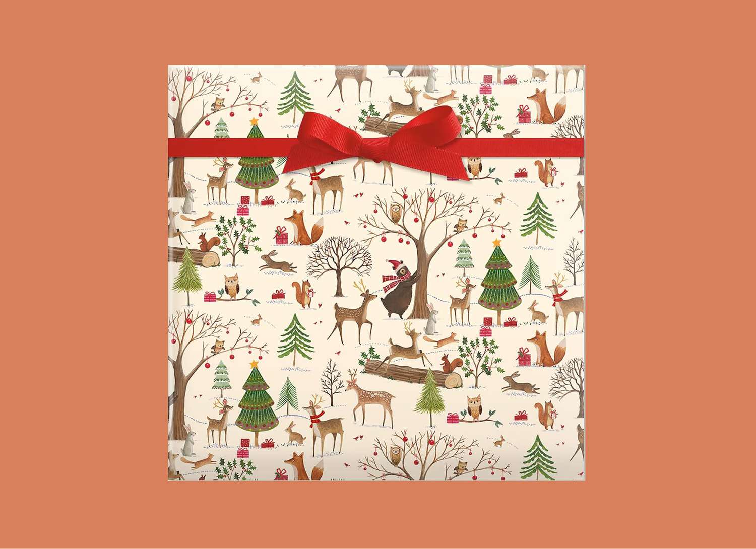 holiday wrapped gift red bow with an orange background