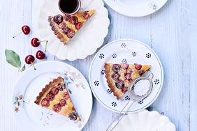 sour-cherry frangipane tart topped with powdered sugar