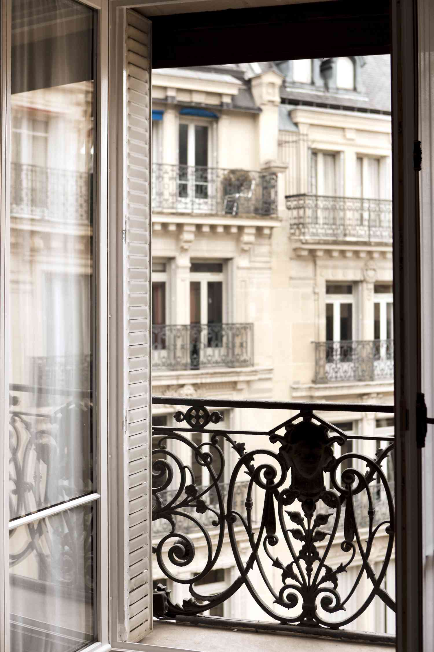 view from paris apartment with iron balcony