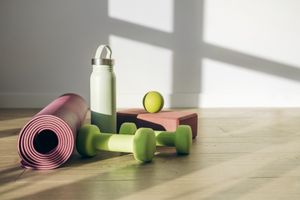 Yoga mat water bottle dumbbells and other exercise equipment