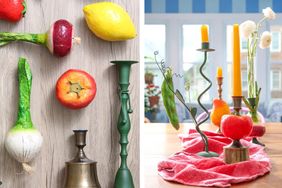 A creative arrangement of fruits and vegetables paired with candlesticks designed to imitate candlestick holders