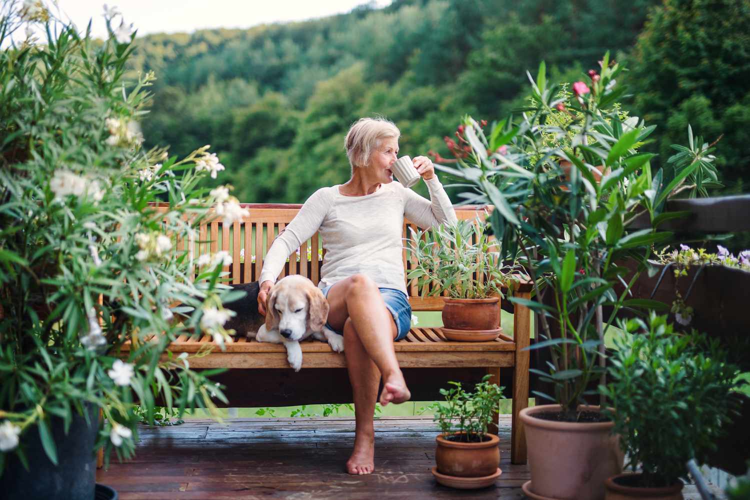 Woman enjoying outdoors with dog