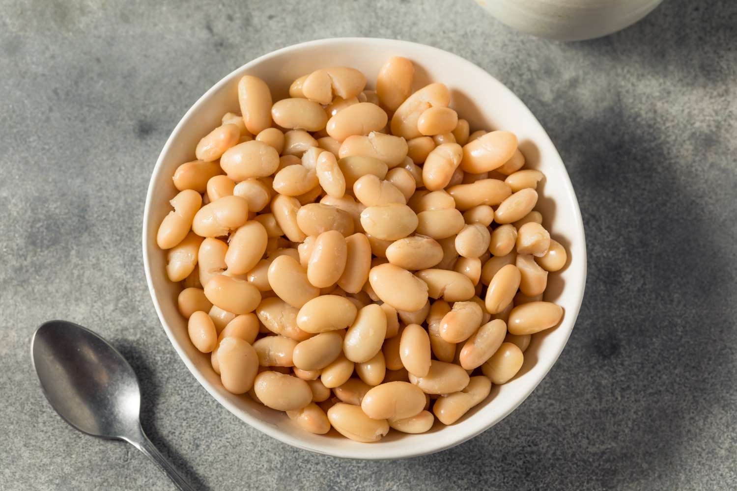 cannellini beans in white bowl