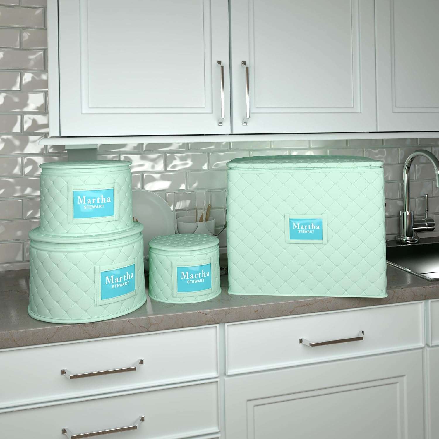 Set of labeled storage containers on a kitchen countertop